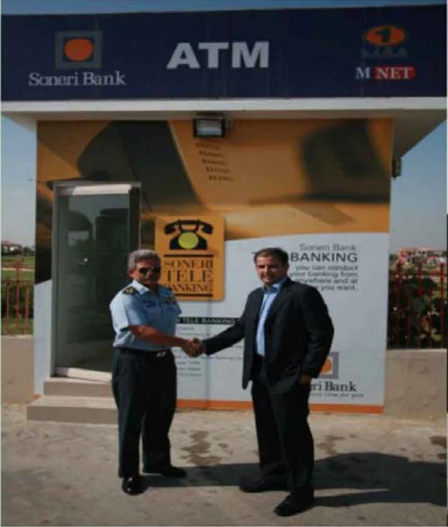 ECOMS inauguration photograph outside the Soneri Bank ATM at PAF Museum Faisal
